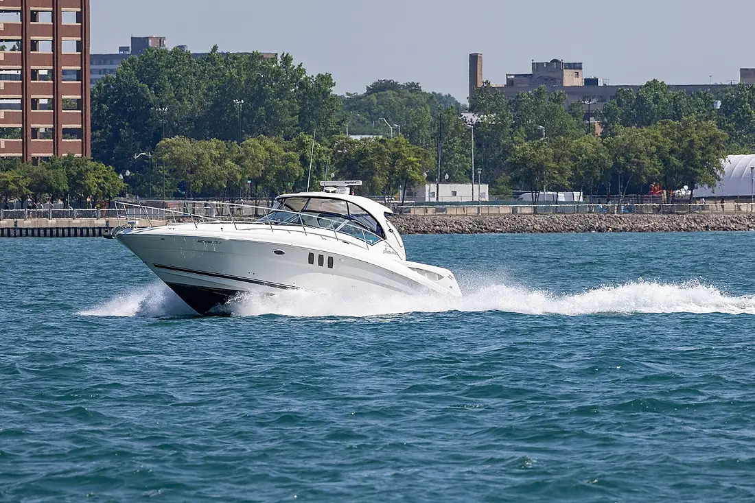 Pleasure boat Sundancer on the Detroit River from Windsor, Ontario, 2025-07-05