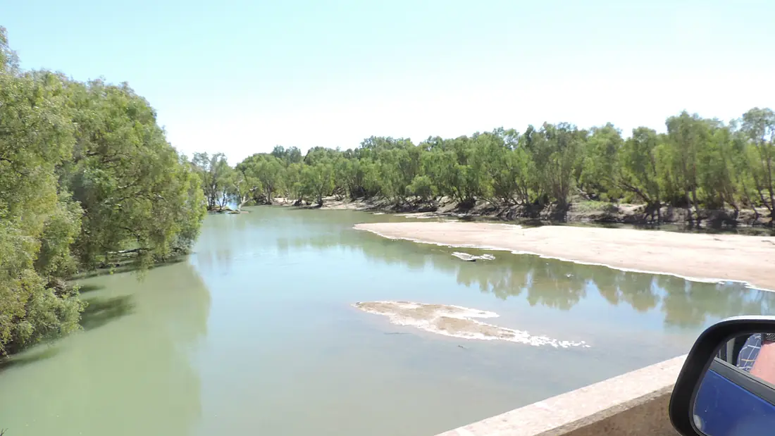 Looking downstream along the Flinders River while crossing on the Burke Developmental Road, Normanton, June 2019 01